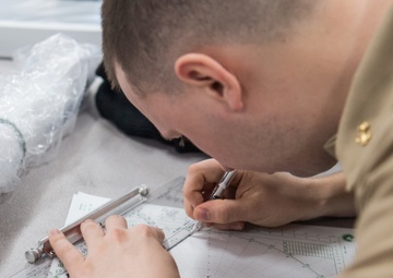 200106-N-TE695-1003 NEWPORT, R.I. (Jan. 6, 2020) – Navy Officer Candidate School (OCS) practices manuever boards