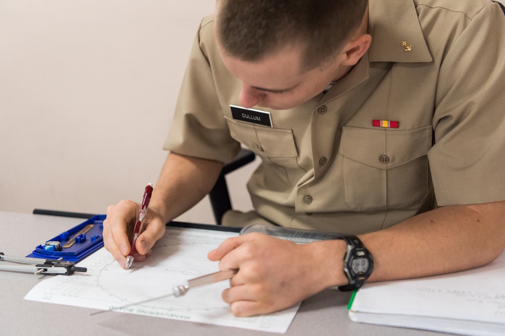 200106-N-TE695-1006 NEWPORT, R.I. (Jan. 6, 2020) – Navy Officer Candidate School (OCS) practices manuever boards