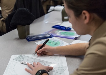 200106-N-TE695-1007 NEWPORT, R.I. (Jan. 6, 2020) – Navy Officer Candidate School (OCS) practices manuever boards