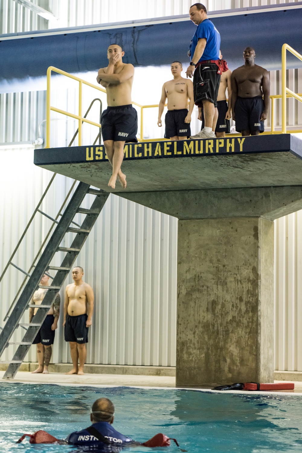 200107-N-TE695-1001 NEWPORT, R.I. (Jan. 7, 2020) -- Navy Officer Candidate School (OCS) take the third-class swimmer test