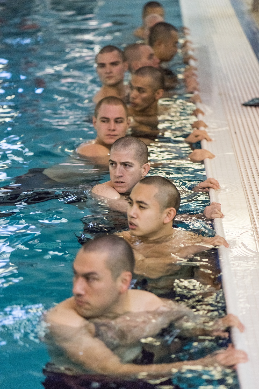 200107-N-TE695-1005 NEWPORT, R.I. (Jan. 7, 2020) -- Navy Officer Candidate School (OCS) take the third-class swimmer test