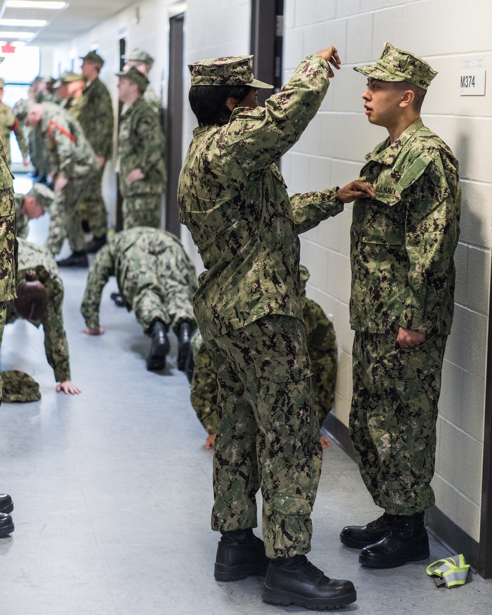 200110-N-TE695-1006 NEWPORT, R.I. (Jan. 10, 2020) -- Navy Officer Candidate School conducts a uniform inspection