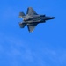 F-35s and F-16s soar in the morning sky