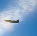 F-35s and F-16s soar in the morning sky