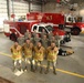 148th FW Firefighters Pose with newly acquired P-26 Water Tender