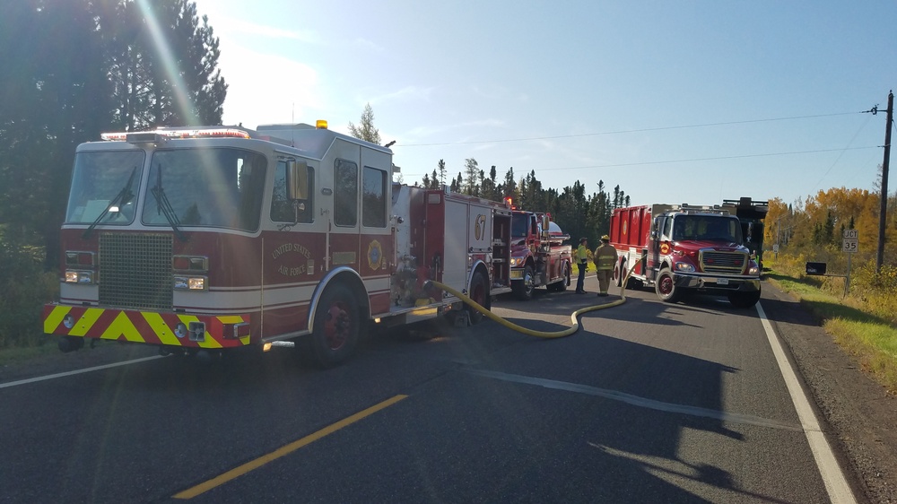 148th FW Firefighters Pose with newly acquired P-26 Water Tender