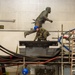 GHWB Sailor Secures Statue