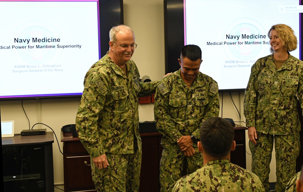 Rear Adm. Bruce Gillingham, Navy Surgeon General, recognizes Sailors during his visit to Naval Medical Readiness Training Command Pearl Harbor