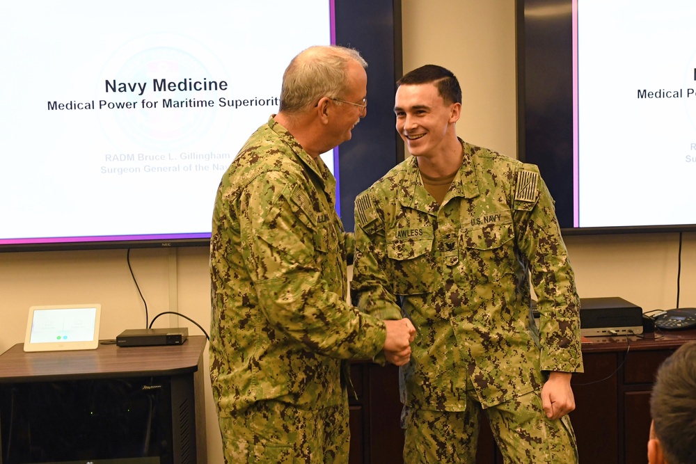 Rear Adm. Bruce Gillingham, Navy Surgeon General, recognizes Sailors during his visit to Naval Medical Readiness Training Command Pearl Harbor