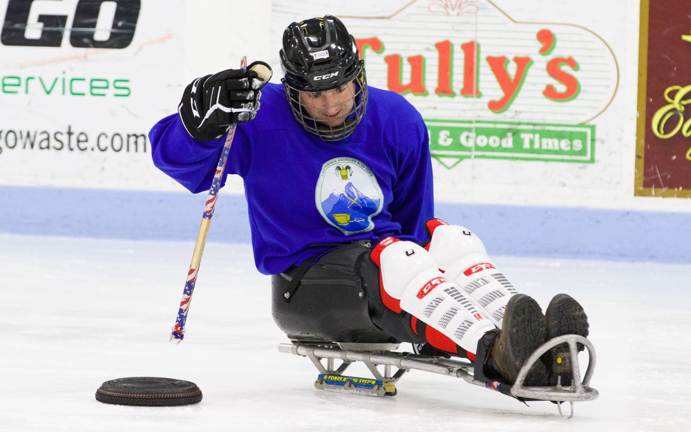 10th Mountain Division's Warrior Transition Battalion Soldiers participate in sled hockey