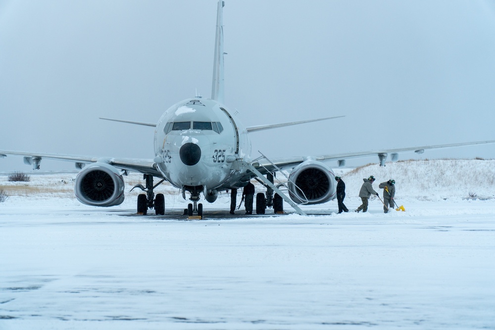 Sailors Clear Snow for P-8A Poseidon