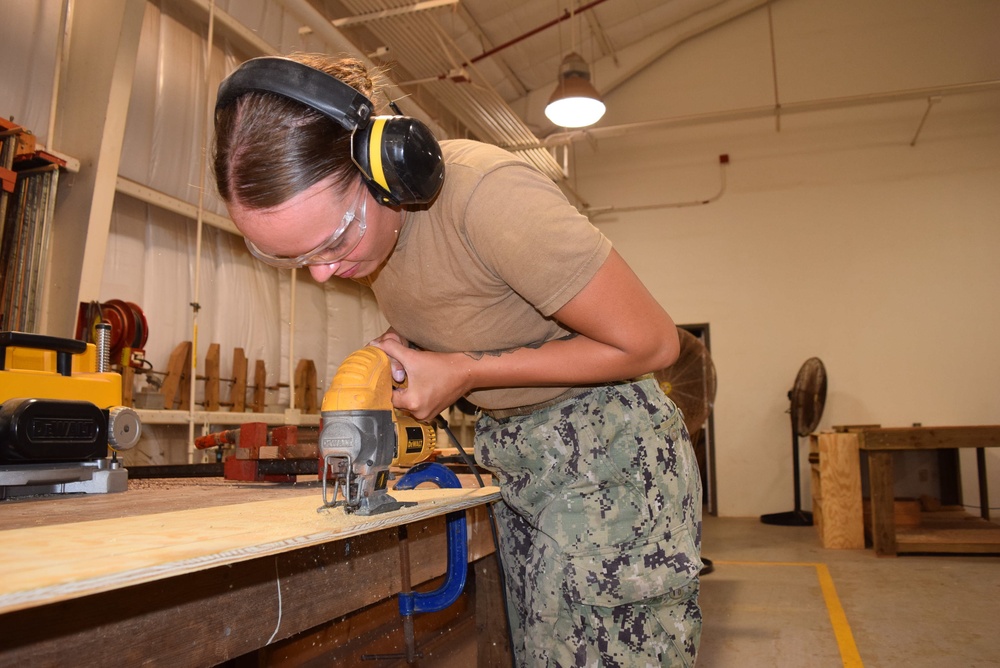 U.S. Navy Seabees from NMCB 5’s Detail Diego Garcia conduct high quality construction