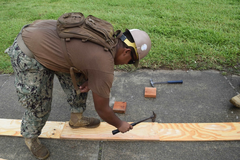 U.S. Navy Seabees from NMCB 5’s Detail Diego Garcia conduct high quality construction