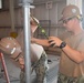 U.S. Navy Seabees from NMCB 5’s Detail Diego Garcia conduct high quality construction