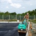 U.S. Navy Seabees with NMCB-5 lay asphalt on board Marine Corps Air Station Futenma