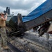 U.S. Navy Seabees with NMCB-5 lay asphalt on board Marine Corps Air Station Futenma