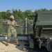 U.S. Navy Seabees with NMCB-5 lay asphalt on board Marine Corps Air Station Futenma