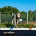 U.S. Navy Seabees with NMCB-5 lay asphalt on board Marine Corps Air Station Futenma