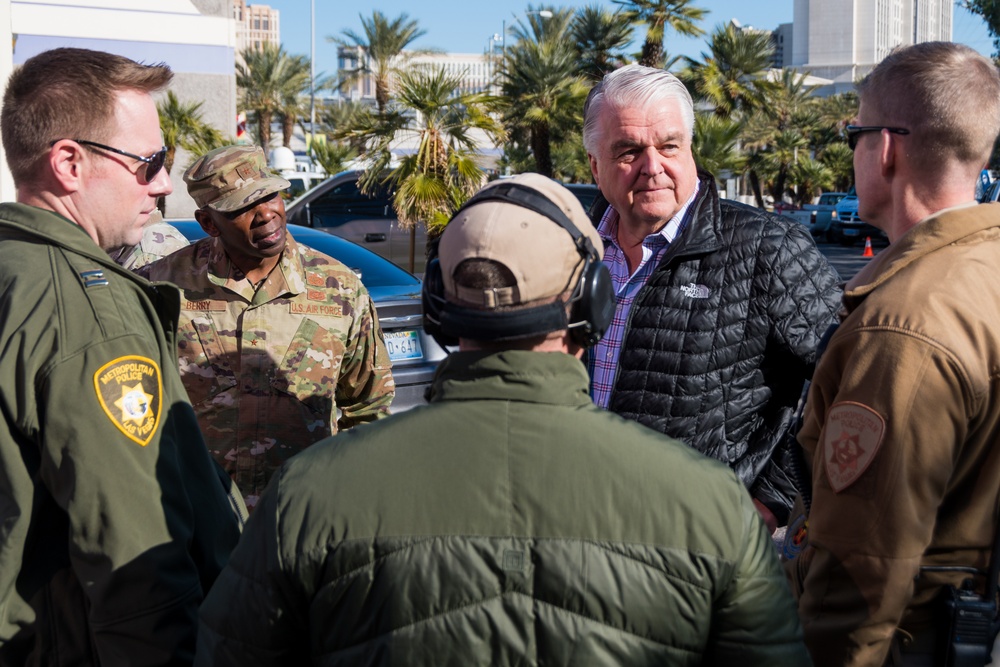 Nevada Adjutant General Ondra Berry and Governor Steve Sisolak speak with members of the Las Vegas Metropolitan Police Department