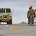 Soldiers, Airmen and contractors clearing debris after Al-Asad Airbase missile attack