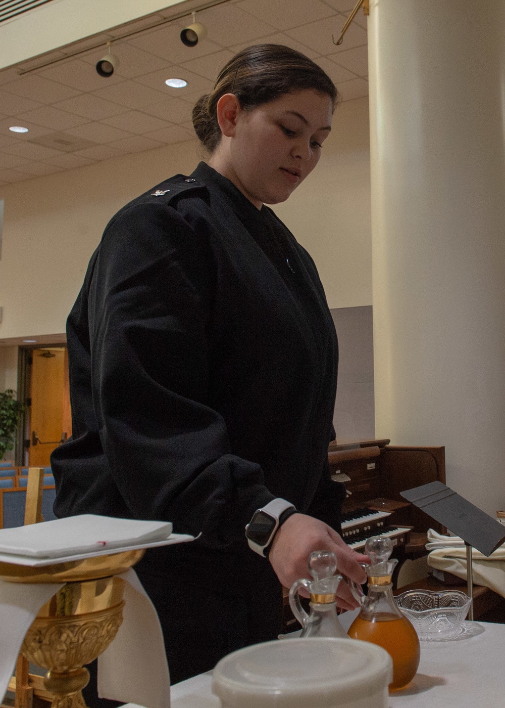 Religious Program Specialist Sets Up for Cathloic Mass