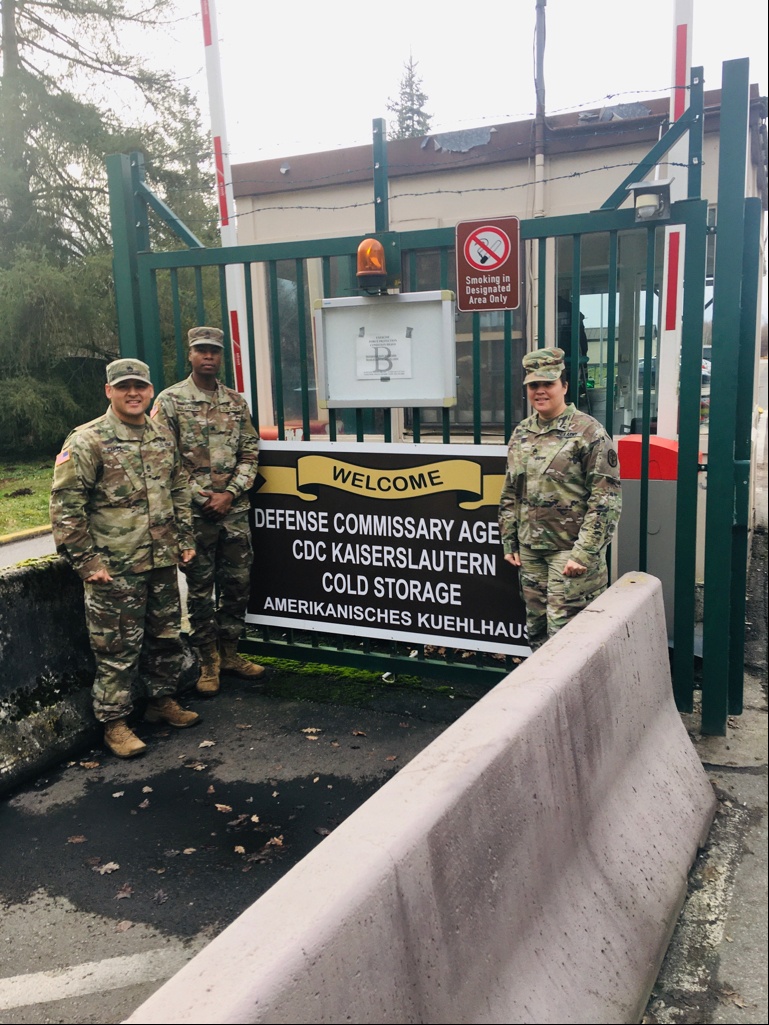 Sgt. 1st Class Miguel Garza, Sgt. Dominique Williams and Staff Sgt. Abigail Lopez, food inspectors at Veterinary Branch Kaiserslautern (left to right), in front of the Defense Commissary Agency CDC Kaiserslautern Cold Storage.