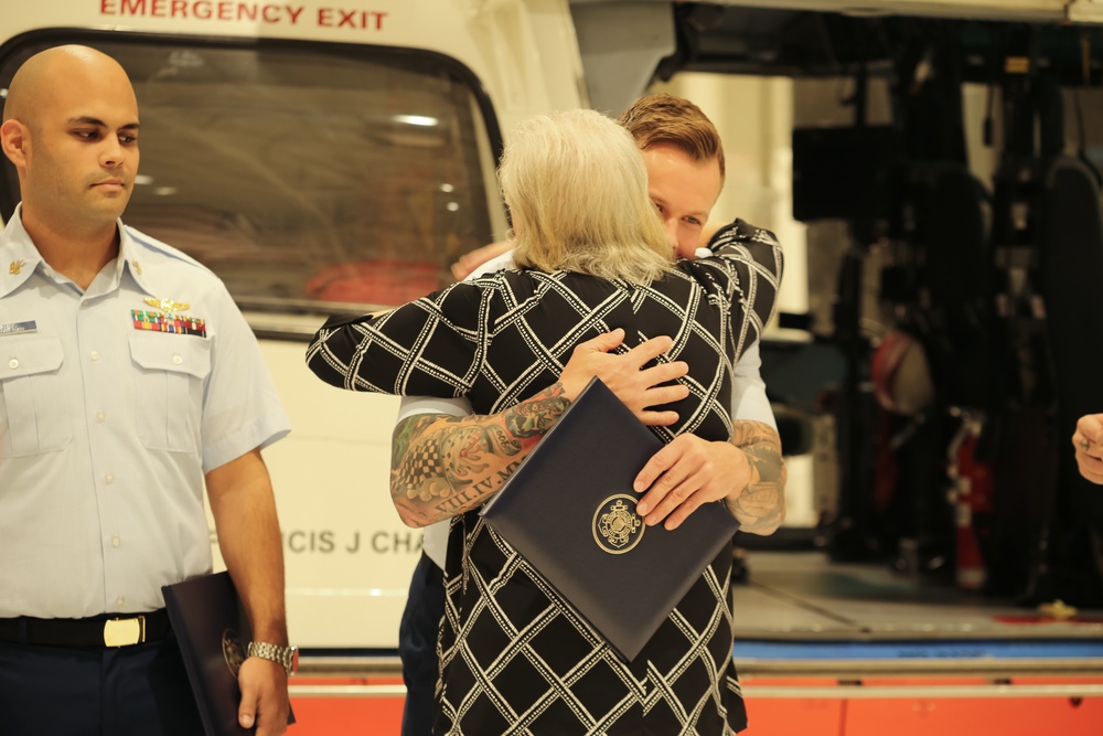 Coast Guard honors rescue swimmer for actions taken during Tropical Storm Imelda in Houston