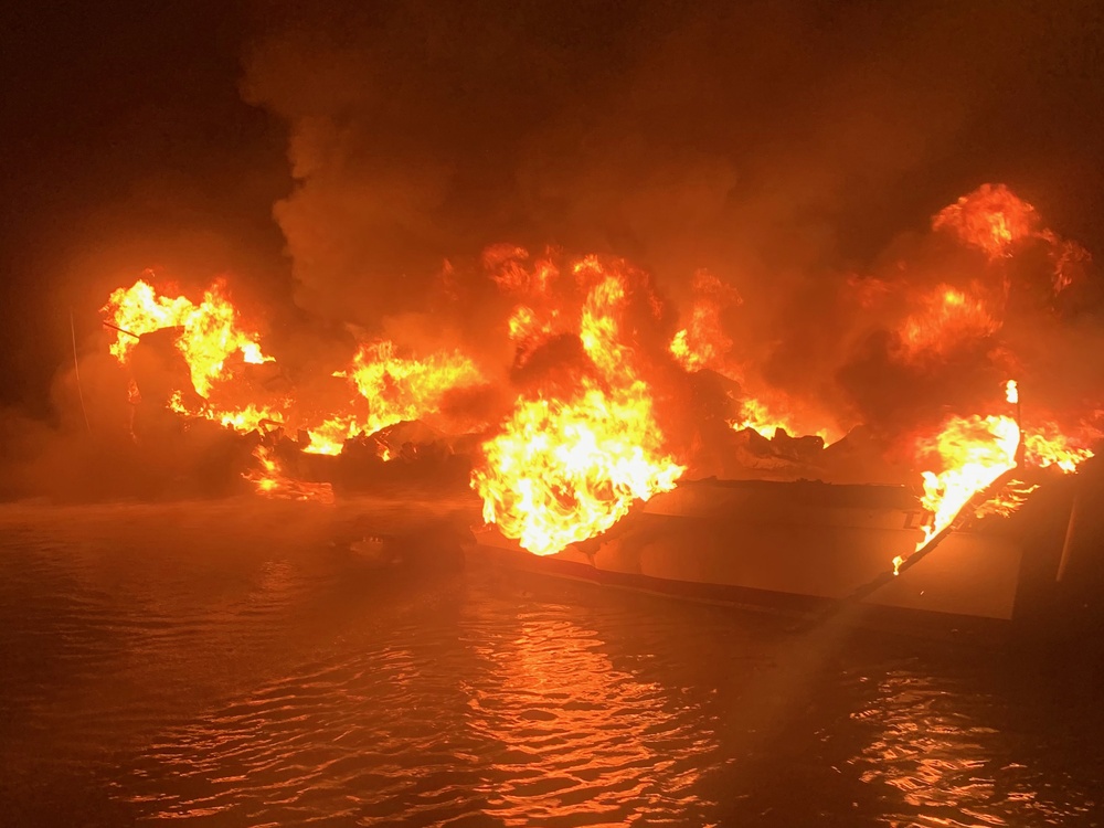 Coast Guard rescues 3 people from burning vessel