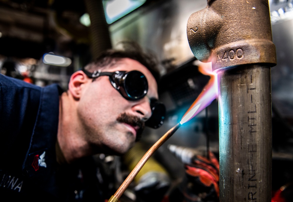 Hull Maintenance Technicians Practice Welding Aboard USS Milius (DDG 69)