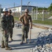 Commander, Naval Construction Group One, visits U.S Navy Seabees deployed with Naval Mobile Construction Battalion 5