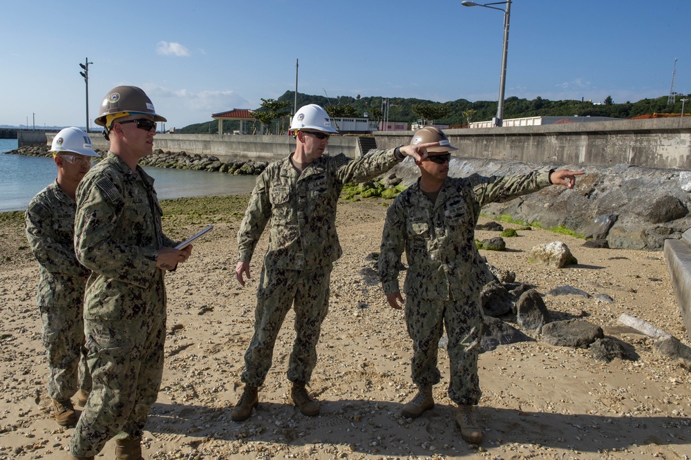 Commander, Naval Construction Group One, visits U.S Navy Seabees deployed with Naval Mobile Construction Battalion 5