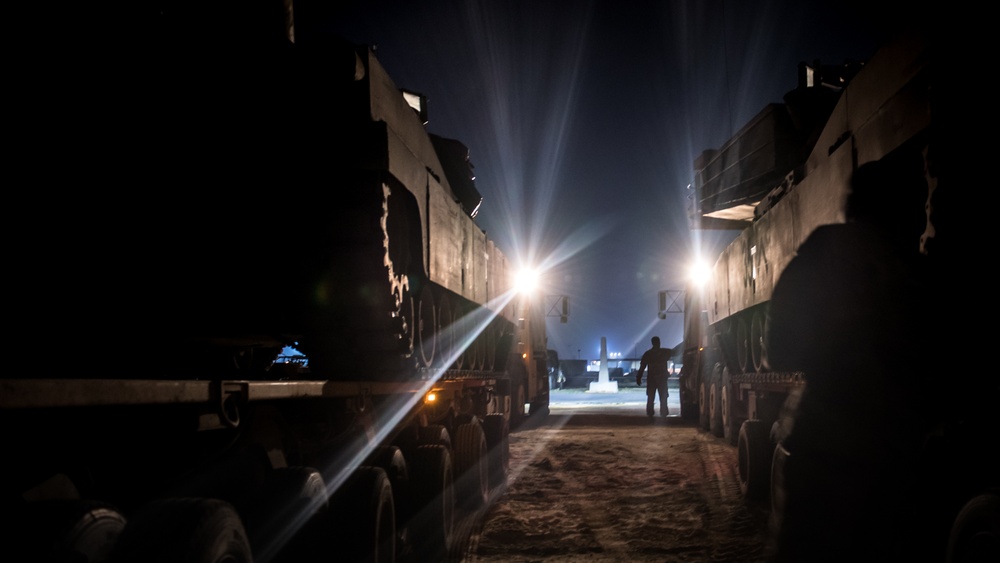 Airmen, Soldiers work together to transport heavy vehicles