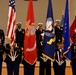 A joint-service flag detail presents the colors during a change-of-charge ceremony aboard Naval Support Activity Philadelphia.