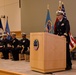 Cmdr. A.J. Kruppa speaks during a change-of-charge ceremony aboard NSA Philadelphia.
