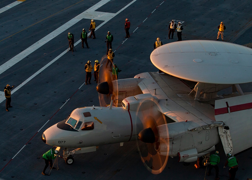 Sailors offload helicopter