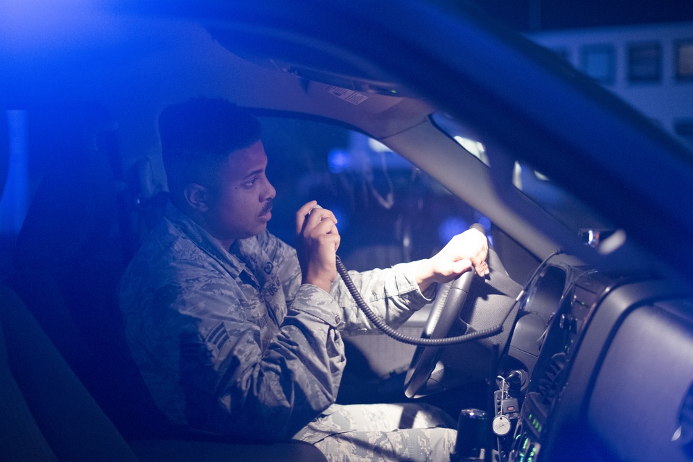 86 OSS Airman shines in the night