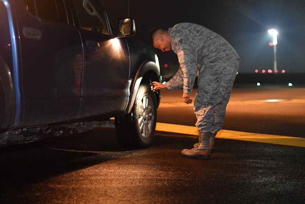 86 OSS Airman shines in the night