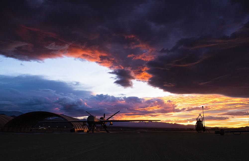 MQ-9 Reaper and aircrew underneath Nevada Sunset