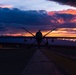 MQ-9 Reaper and aircrew underneath Nevada sunset