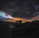 MQ-9 Reaper and aircrew underneath Nevada sunset