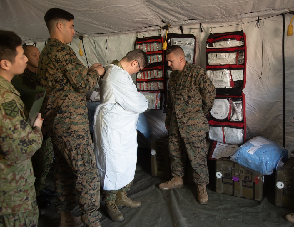 Iron Fist 2020: U.S. Sailors demonstrate field surgical and en flight medical capabilities to Japan Self Defense Force soldiers.