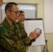 Iron Fist 2020: Japanese Ground Self Defense Force soldiers demonstrate combat medical care procedures to U.S. Sailors.