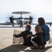 Family and friends prepare for the return of Airborne Early Warning Squadron (VAW) 121