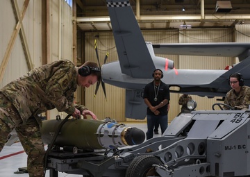 Cannon weapons loading crews put their skills to the test during 4th quarter competition