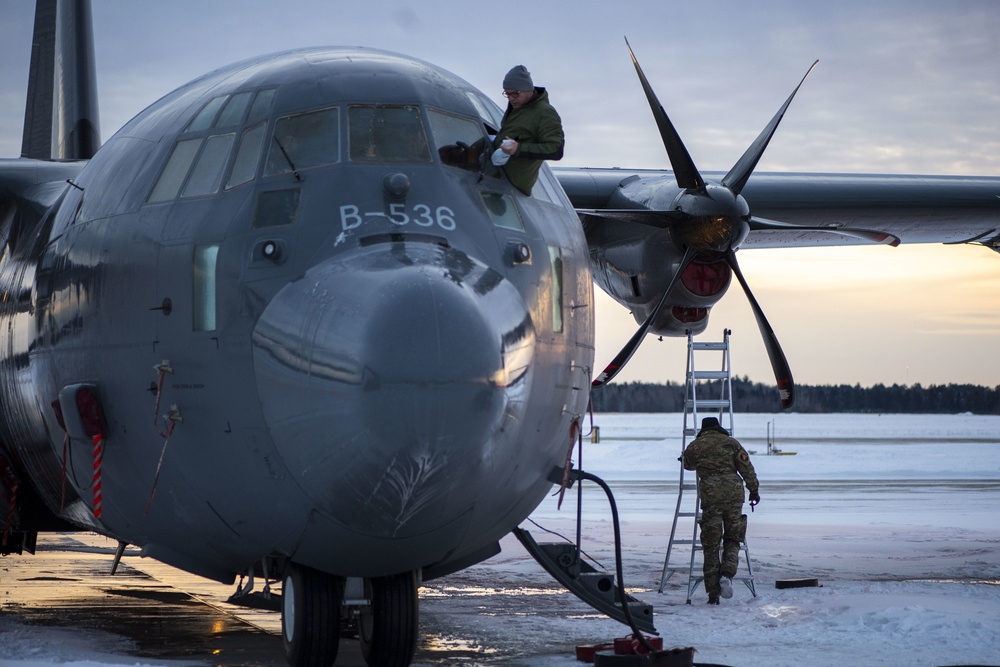 Danish Air Force de-icing C-130 for Michigan takeoff