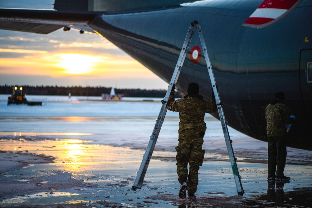 Danish Air Force de-icing C-130 for Michigan take-off