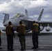 Sailors prepare an F-18 Super Hornet