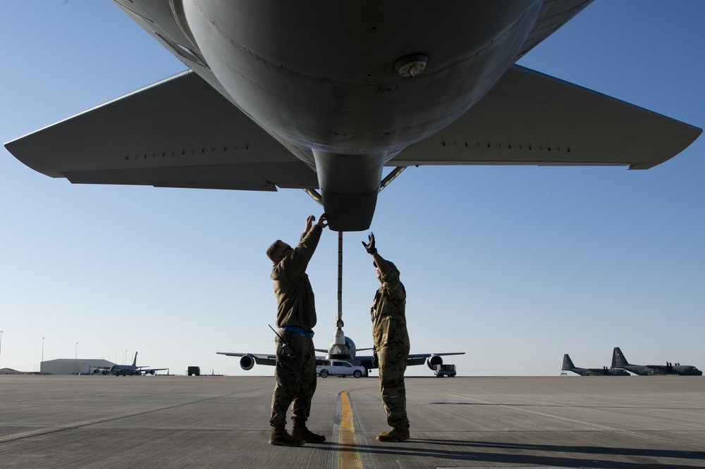 A U.S. Air Force KC-135 aircrew assigned to the 28th Expeditionary Air Refueling Squadron conducts aerial refueling over Afghanistan.