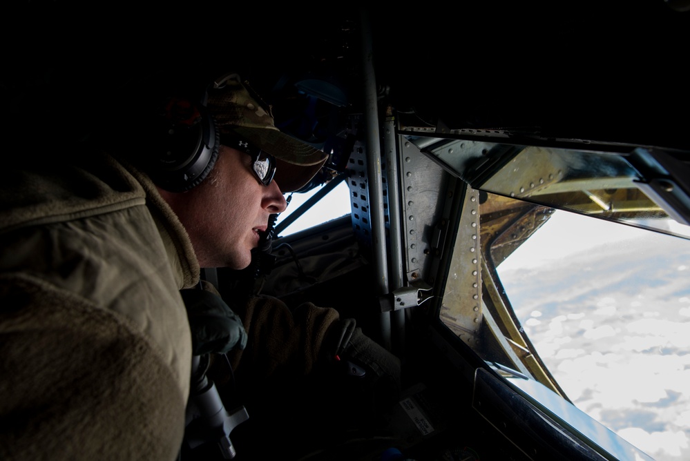 A U.S. Air Force KC-135 aircrew assigned to the 28th Expeditionary Air Refueling Squadron conducts aerial refueling over Afghanistan.