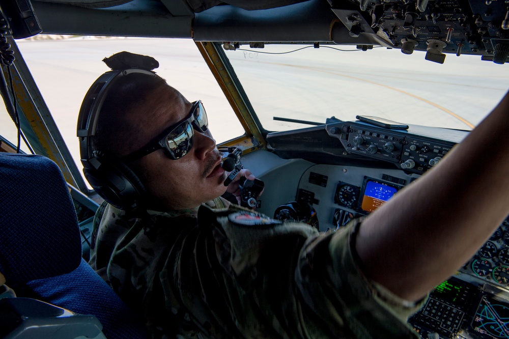 A U.S. Air Force KC-135 aircrew assigned to the 28th Expeditionary Air Refueling Squadron conducts aerial refueling over Afghanistan.